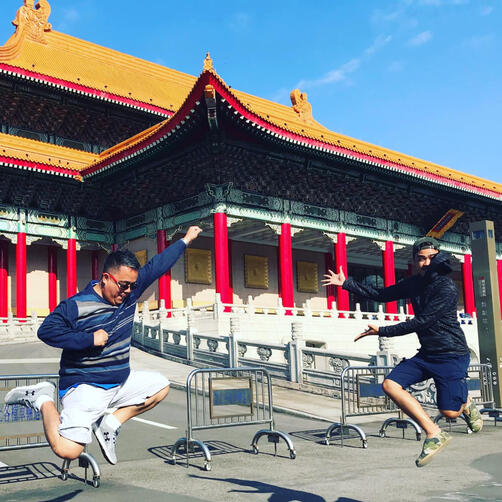 Dr. James Nilo (Our Founder and General Manager) and Mr. Justin Josh Nilo (Guimba Branch Manager) try a jumpshot in front of Taiwan’s National Theater and Concert Hall.
